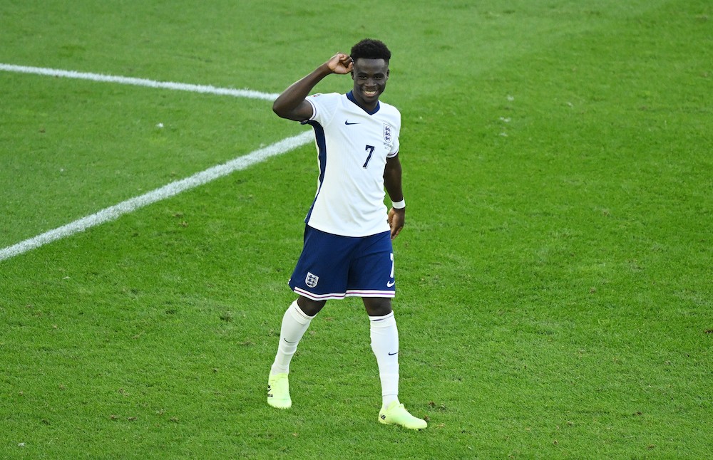 DUSSELDORF, GERMANY: Bukayo Saka of England celebrates scoring the team's third penalty in the penalty shoot out during the UEFA EURO 2024 quarter-...