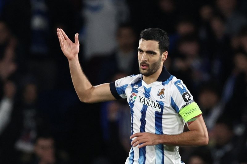 Real Sociedad's Mikel Merino celebrates scoring a goal during the UEFA Champions League last 16 second leg football match between Real Sociedad and...