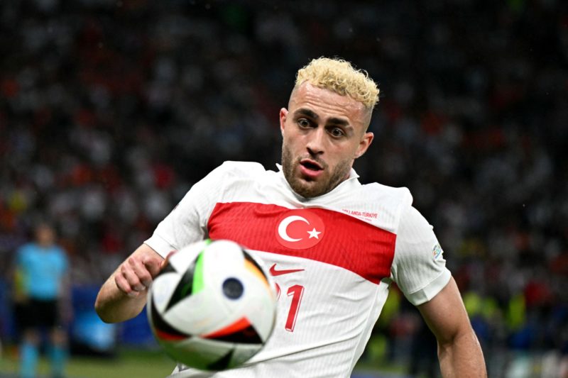 Turkey's forward #21 Baris Alper Yilmaz runs for the ball during the UEFA Euro 2024 quarter-final football match between the Netherlands and Turkey...