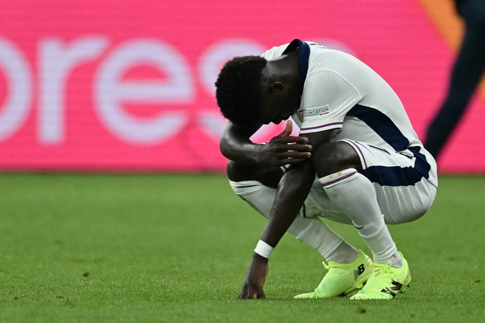 England's Bukayo Saka reacts after the UEFA Euro 2024 final football match between Spain and England at the Olympiastadion in Berlin on July 14, 20...