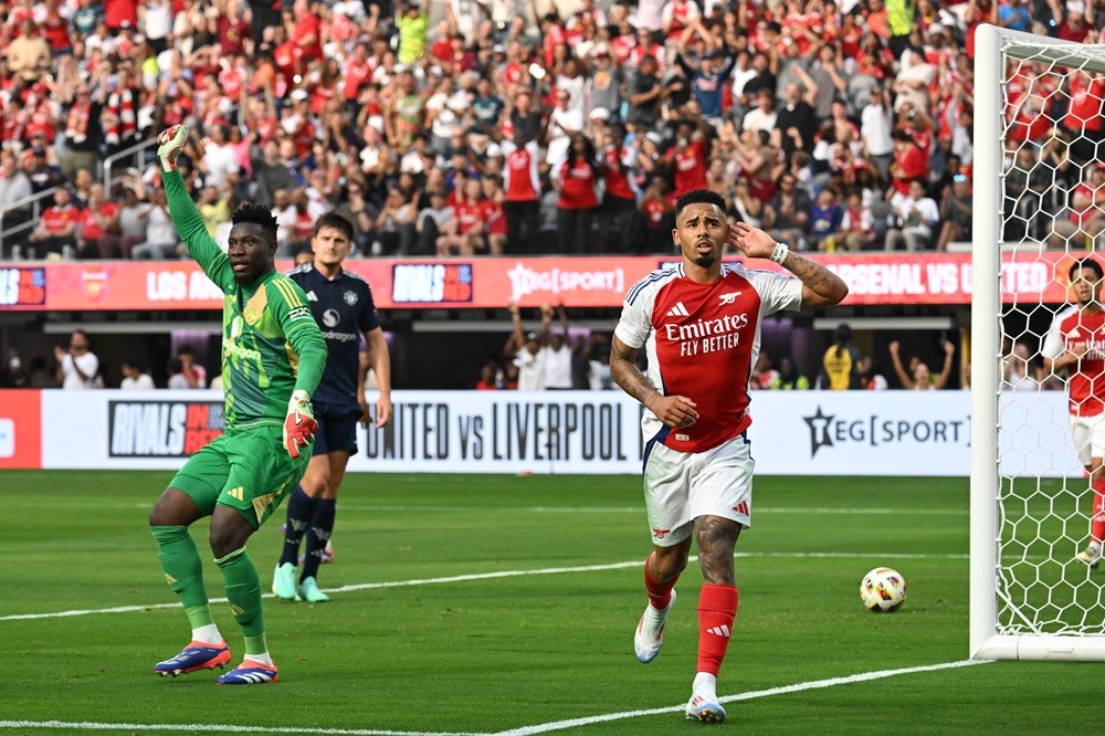 Manchester United's Andre Onana reacts to a goal from Arsenal's Gabriel Jesus during the pre-season club friendly football match between Manchester United FC and Arsenal FC at SoFi Stadium in Inglewood, California on July 27, 2024. (Photo by PATRICK T. FALLON/AFP via Getty Images)