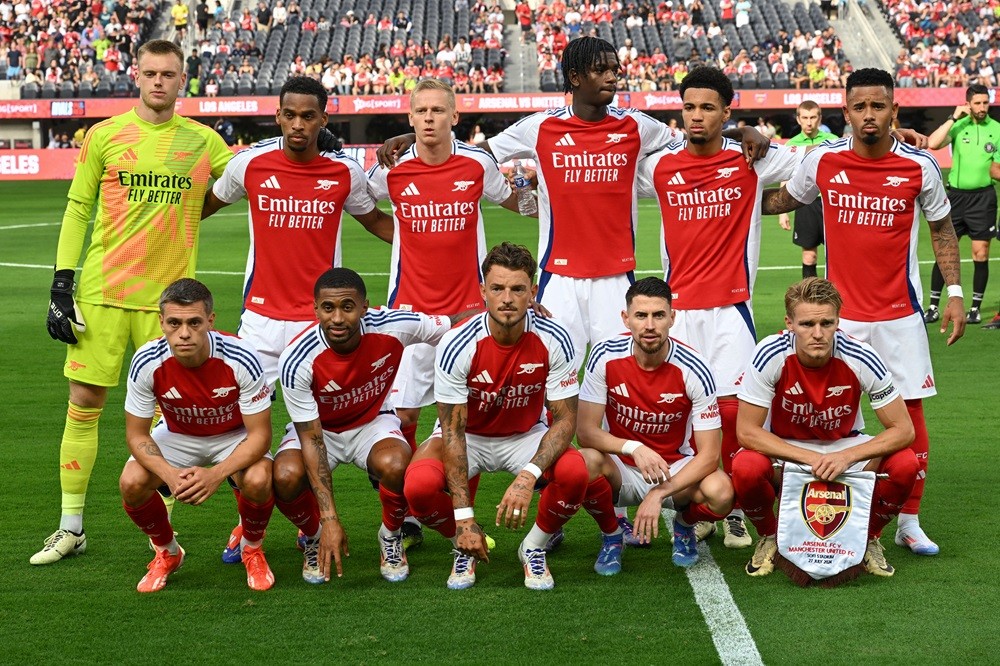 Arsenal players pose ahead of the pre-season club friendly football match between Manchester United FC and Arsenal FC at SoFi Stadium in Inglewood,...
