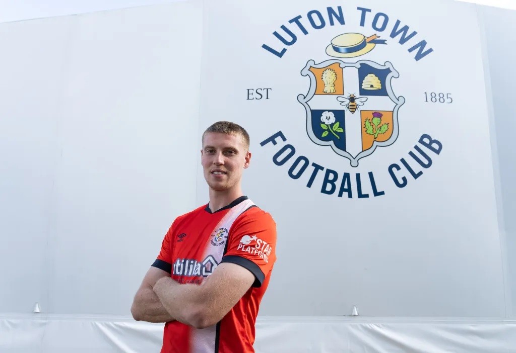 Mark McGuinness signs for Luton Town (Photo via LutonTown.co.uk)