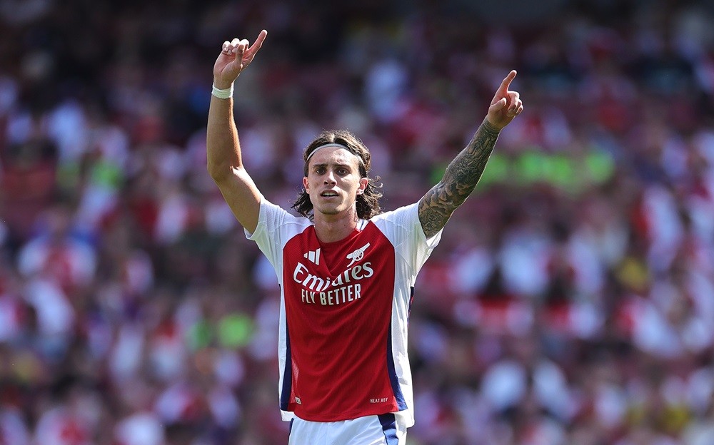 LONDON, ENGLAND: Riccardo Calafiori of Arsenal shouts during the pre-season friendly match between Arsenal and Olympique Lyonnais at the Emirates S...