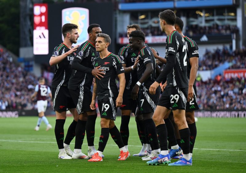 BIRMINGHAM, ENGLAND - AUGUST 24: Leandro Trossard of Arsenal celebrates scoring his team's first goal with teammates during the Premier League matc...