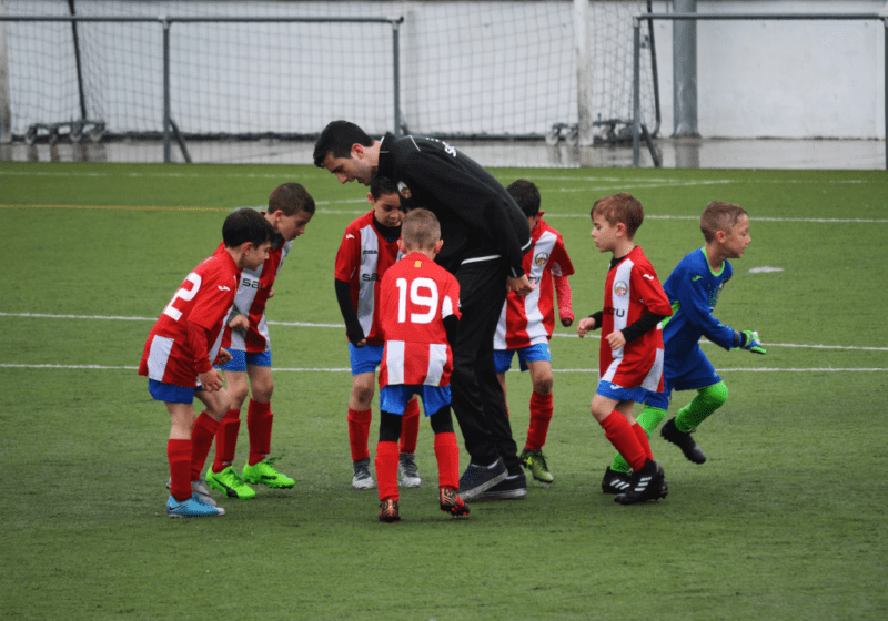 kids playing soccer football
