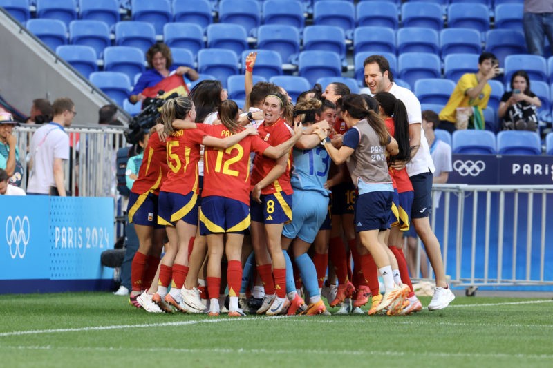 LYON, FRANCE - AUGUST 03: Mariona Caldentey #8 of Team Spain and teammates celebrate victory after the Women's Quarterfinal match between Spain and...