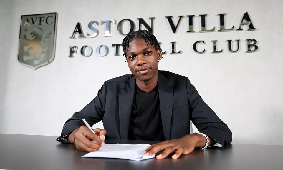 Owen Asemota signing for Aston Villa (Photo via Asemota on Instagram)