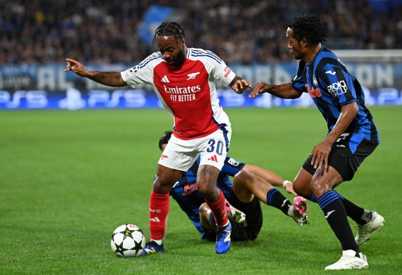 BERGAMO, ITALY - SEPTEMBER 19: Raheem Sterling of Arsenal takes on Juan Cuadrado of Atalanta during the UEFA Champions League 2024/25 League Phase ...