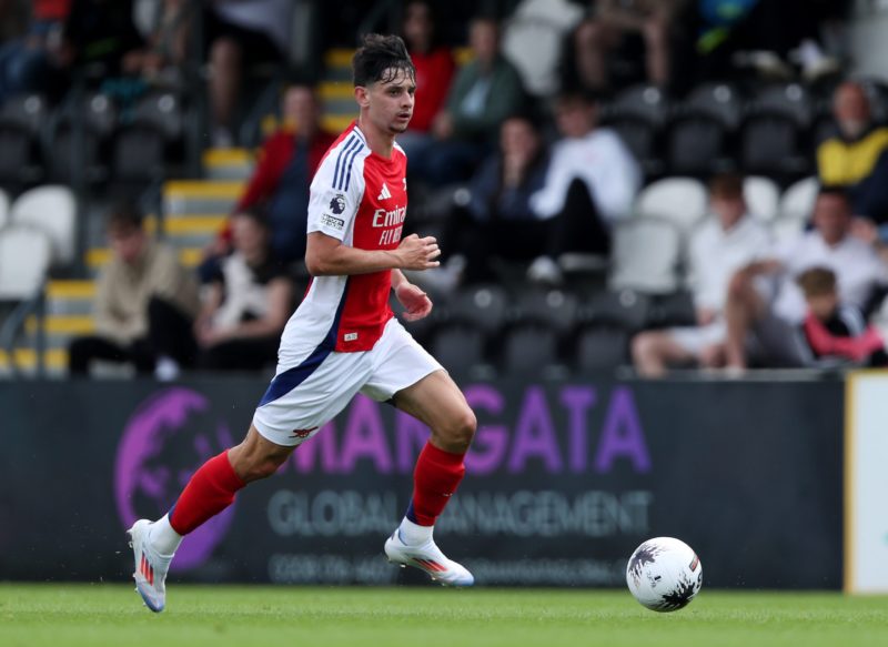 BOREHAMWOOD, ENGLAND - JULY 13: Charlie Patino of Arsenal XI runs with the ball during the Pre-Season Friendly match between Boreham Wood and Arsen...