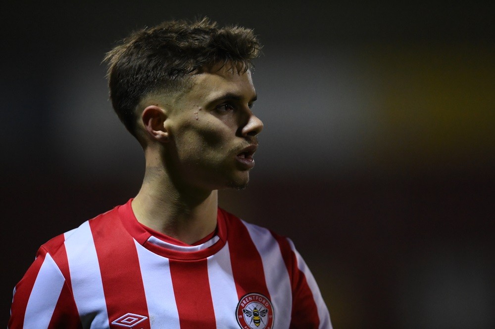 WOKING, ENGLAND: Romeo Beckham of Brentford B in action during the Premier League Cup match between Brentford B and Aston Villa U21 at The Laithwai...