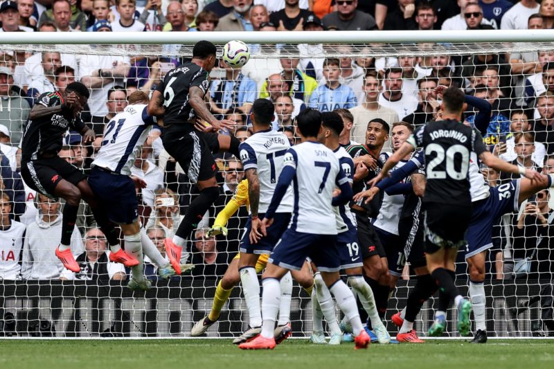 Arsenal's Brazilian defender #06 Gabriel Magalhaes scores the team's first goal during the English Premier League football match between Tottenham ...