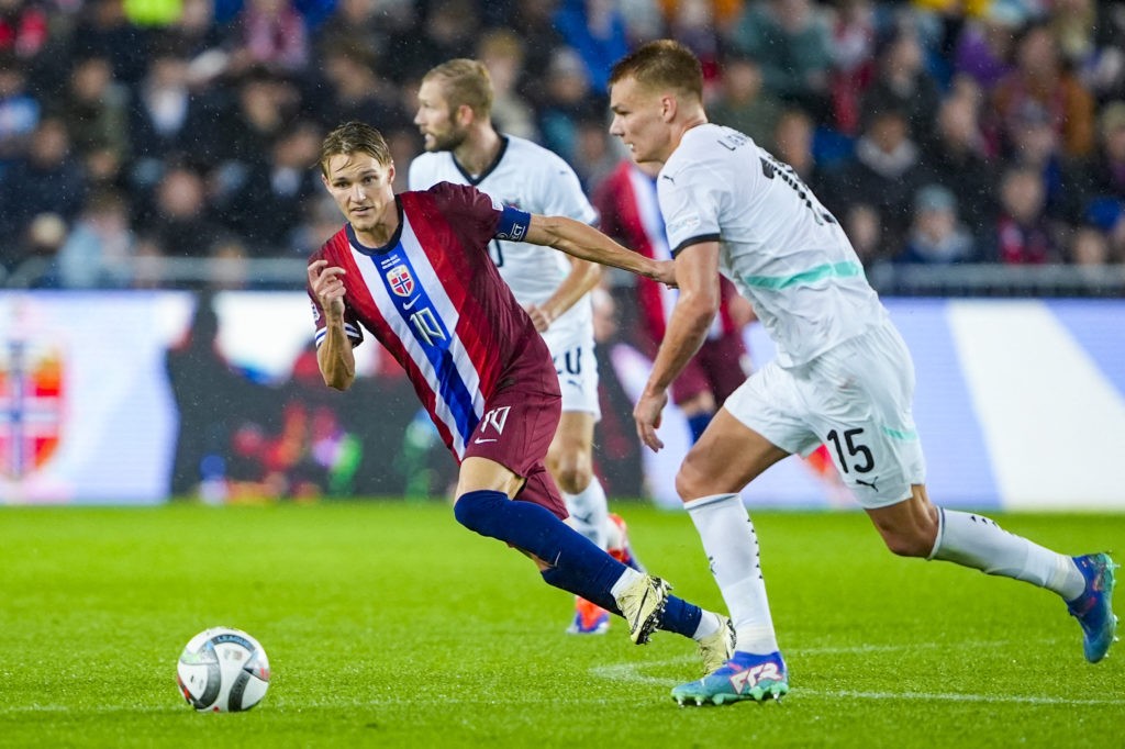 Norway's midfielder #10 Martin Odegaard and Austria's defender #15 Philipp Lienhart vie for the ball during the UEFA Nations League, League B, Group B3 football match Norway vs Austria at the Ullevaal Stadium in Oslo, Norway on September 9, 2024. (Photo by Terje Pedersen / NTB / AFP) / Norway OUT (Photo by TERJE PEDERSEN/NTB/AFP via Getty Images)