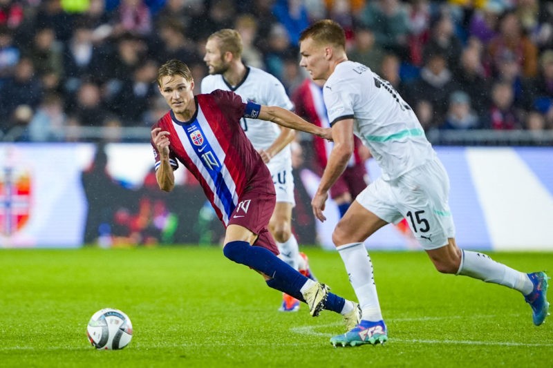 Norway's midfielder #10 Martin Odegaard and Austria's defender #15 Philipp Lienhart vie for the ball during the UEFA Nations League, League B, Grou...