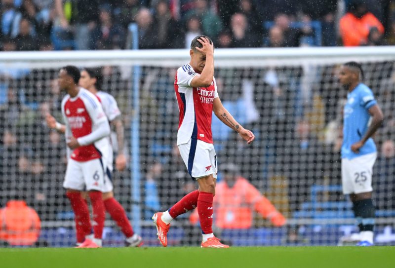 MANCHESTER, ENGLAND - SEPTEMBER 22: Leandro Trossard of Arsenal leaves the pitch after being shown a red card during the Premier League match betwe...