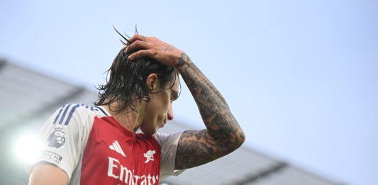 MANCHESTER, ENGLAND - SEPTEMBER 22: Riccardo Calafiori of Arsenal looks on during the Premier League match between Manchester City FC and Arsenal FC at Etihad Stadium on September 22, 2024 in Manchester, England. (Photo by Michael Regan/Getty Images)