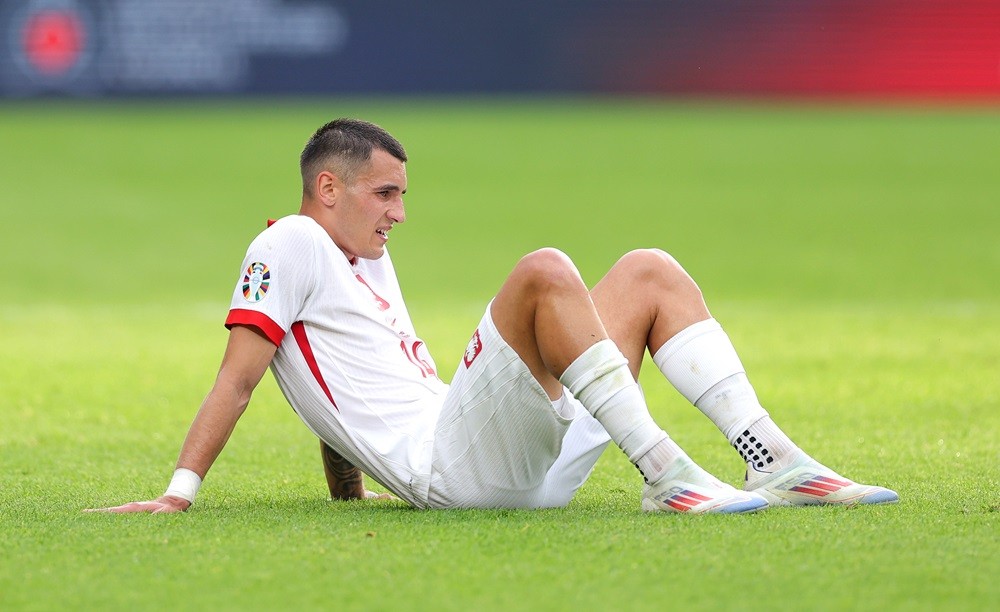 BERLIN, GERMANY: Jakub Kiwior of Poland looks dejected after the team's defeat in the UEFA EURO 2024 group stage match between Poland and Austria a...