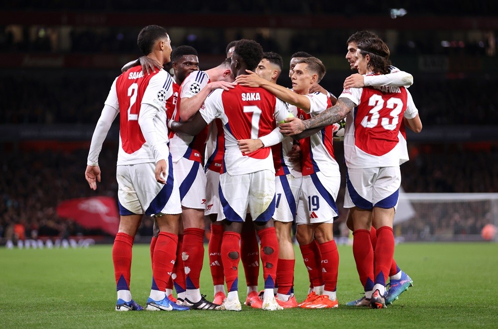 Bukayo Saka makes Premier League title claim 3 LONDON, ENGLAND: Bukayo Saka of Arsenal celebrates scoring his team's second goal with teammates during the UEFA Champions League 2024/25 League Phase MD2 match between Arsenal FC and Paris Saint-Germain at Emirates Stadium on October 01, 2024. (Photo by Julian Finney/Getty Images)