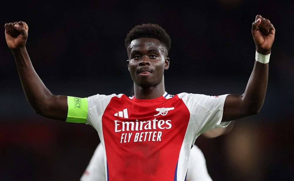 LONDON, ENGLAND: Bukayo Saka celebrates scoring his goal during the UEFA Champions League 2024/25 League Phase MD2 match between Arsenal FC and Par...