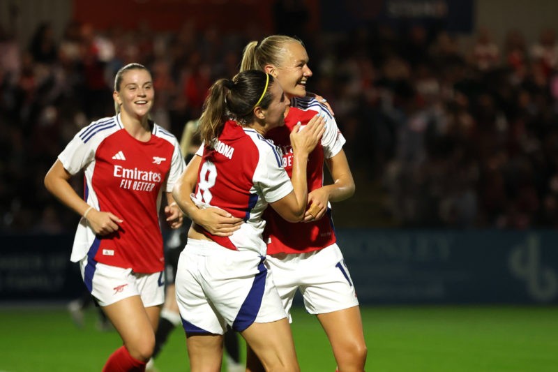 BOREHAMWOOD, ENGLAND - SEPTEMBER 07: Frida Maanum of Arsenal celebrates scoring her team's first goal with teammate Mariona Caldentey during the UE...