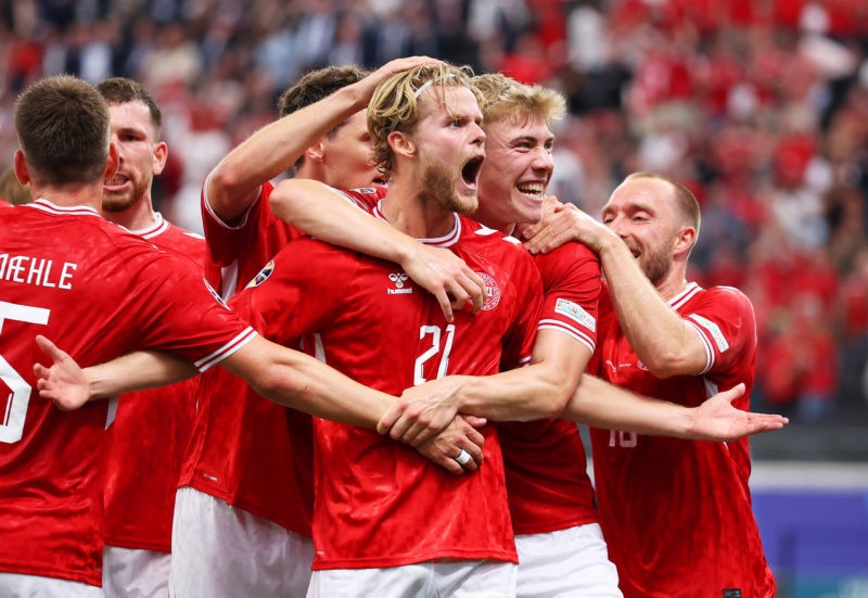 FRANKFURT AM MAIN, GERMANY - JUNE 20: Morten Hjulmand of Denmark celebrates scoring his team's first goal with teammates during the UEFA EURO 2024 ...