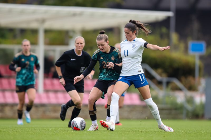 Arsenal youngster nominated for Golden Girl 2 BURTON-UPON-TRENT, ENGLAND - SEPTEMBER 26: Alara Sehitler of Germany is challenged by Freya Godfrey of England during the international friendly match between England Women U19 and Germany Women U19 at St George's Park on September 26, 2023 in Burton-upon-Trent, England. (Photo by Jess Hornby/Getty Images for DFB)