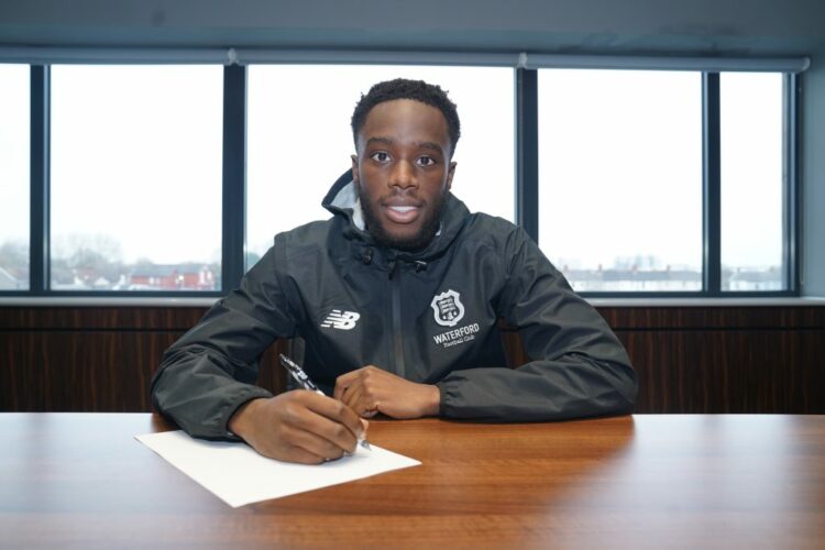 James Olayinka signing for Waterford FC (Photo via WaterfordFC.ie)
