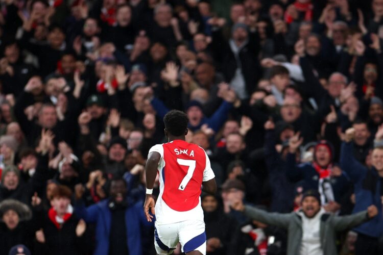 LONDON, ENGLAND: Bukayo Saka of Arsenal celebrates scoring his side's first goal during the Premier League match between Arsenal FC and Nottingham ...