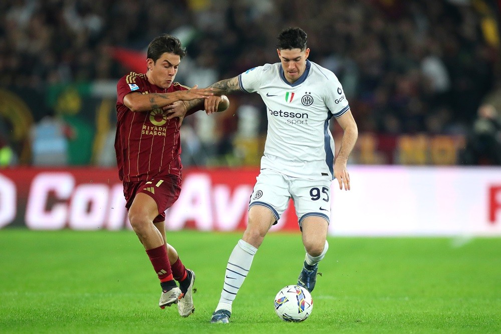 ROME, ITALY: Paulo Dybala of AS Roma competes for the ball with Alessandro Bastoni of FC Internazionale during the Serie A match between AS Roma an...