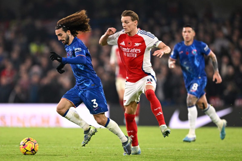 LONDON, ENGLAND - NOVEMBER 10: Marc Cucurella of Chelsea gets past Martin Odegaard of Arsenal during the Premier League match between Chelsea FC and Arsenal FC at Stamford Bridge on November 10, 2024 in London, England. (Photo by Mike Hewitt/Getty Images)