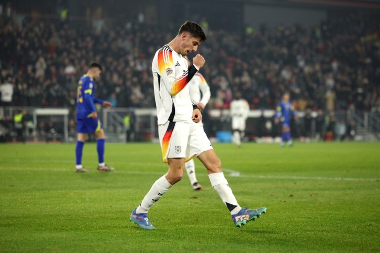 FREIBURG IM BREISGAU, GERMANY: Kai Havertz of Germany celebrates scoring his team's third goal during the UEFA Nations League 2024/25 League A Grou...