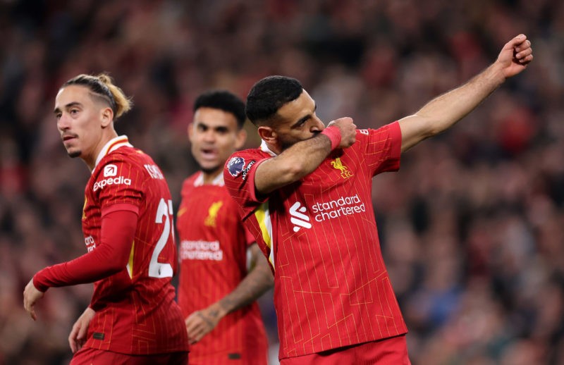 Liverpool injury blow as Arsenal fall further behind 8 LIVERPOOL, ENGLAND - NOVEMBER 02: Mohamed Salah of Liverpool celebrates scoring his team's second goal during the Premier League match between Liverpool FC and Brighton & Hove Albion FC at Anfield on November 02, 2024 in Liverpool, England. (Photo by Jan Kruger/Getty Images)