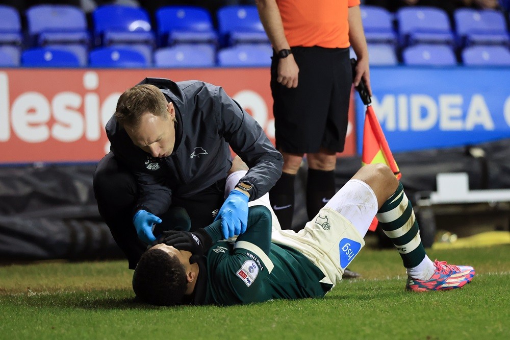 READING, ENGLAND: Tyreece John-Jules of Derby County is treated for injury during the Sky Bet League One match between Reading and Derby County at Select Car Leasing Stadium on January 23, 2024. (Photo by Marc Atkins/Getty Images)