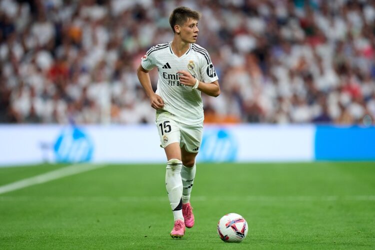 MADRID, SPAIN: Arda Guler of Real Madrid runs with the ball during the La Liga match between Real Madrid CF and Real Valladolid CF at Estadio Santi...