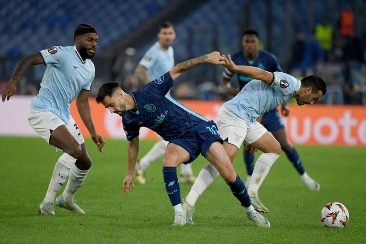 ROME, ITALY: Pedro Rodriguez of SS Lazio compete for the ball with Fabio Vieira of FC Porto during the UEFA Europa League 2024/25 League Phase MD4 ...