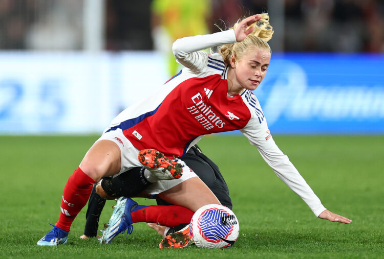 MELBOURNE, AUSTRALIA - MAY 24: Kathrine Kuhl of Arsenal is challenged by Kyah Simon of the All Stars during the exhibition match between A-League A...