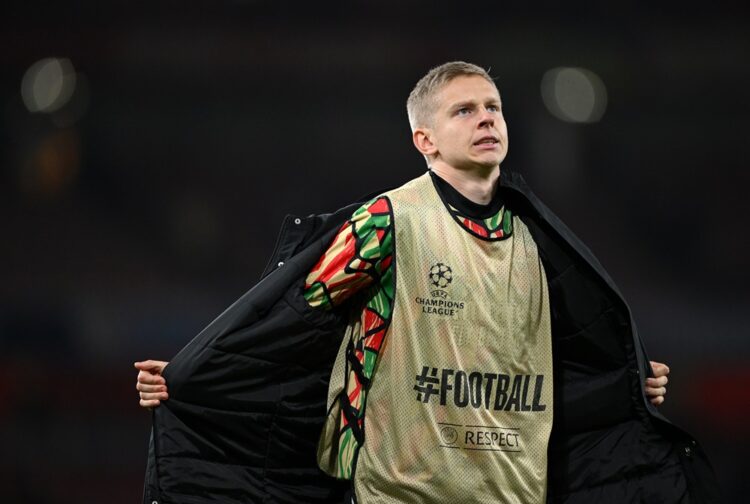 LONDON, ENGLAND: Oleksandr Zinchenko of Arsenal takes his coat off after the UEFA Champions League 2024/25 League Phase MD3 match between Arsenal F...