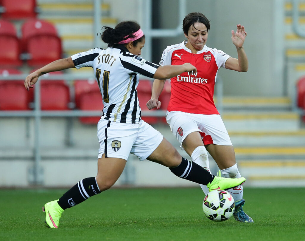 ROTHERHAM, ENGLAND - NOVEMBER 01: Marta Corredera of Arsenal Ladies FC vies for possess from Desiree Scott of Notts Ladies County FC during the WSL Continental Cup Final between Arsenal Ladies FC and Notts County Ladies FC at The New York Stadium on November 1, 2015 in Rotherham, England. (Photo by Daniel Smith/Getty Images)