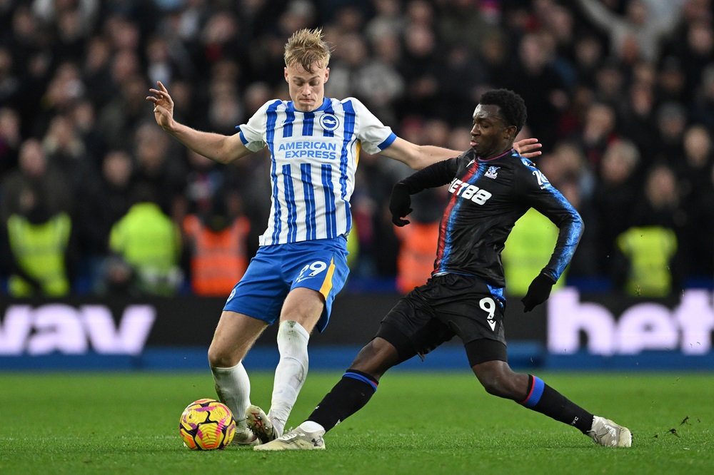 Former Gunner provides assist ahead of 2 games vs Arsenal 2 BRIGHTON, ENGLAND: Jan Paul van Hecke of Brighton & Hove Albion is tackled by Eddie Nketiah of Crystal Palace during the Premier League match between Brighton & Hove Albion FC and Crystal Palace FC at Amex Stadium on December 15, 2024. (Photo by Mike Hewitt/Getty Images)