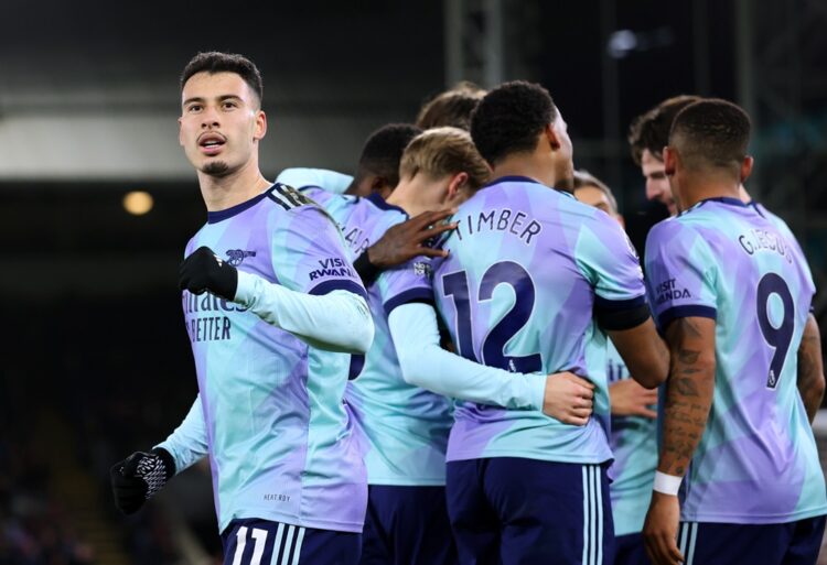 LONDON, ENGLAND: Gabriel Martinelli of Arsenal celebrates scoring his team's fourth goal with teammates during the Premier League match between Cry...
