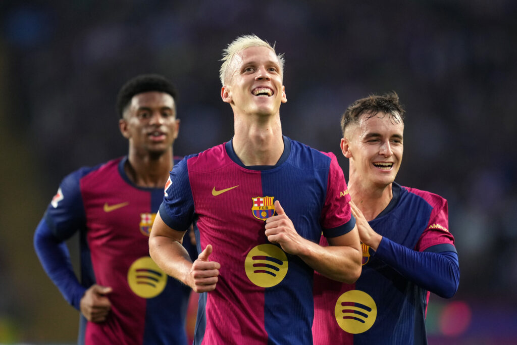 BARCELONA, SPAIN - NOVEMBER 03: Dani Olmo of FC Barcelona celebrates scoring his team's third goal with teammate Marc Casado during the La Liga EA Sports match between FC Barcelona and RCD Espanyol at Estadi Olimpic Lluis Companys on November 03, 2024 in Barcelona, Spain. (Photo by Alex Caparros/Getty Images)