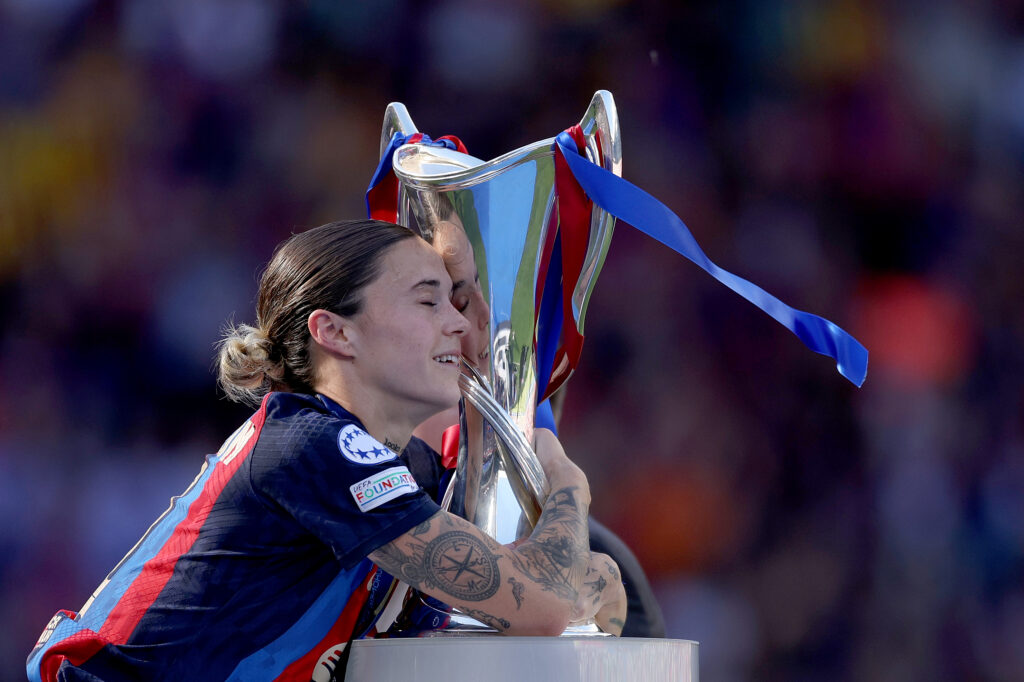 New UEFA WCL format explained 2 EINDHOVEN, NETHERLANDS - JUNE 03: Mapi Leon of FC Barcelona hugs the UEFA Women’s Champions League Trophy after the team's victory during the UEFA Women's Champions League final match between FC Barcelona and VfL Wolfsburg at PSV Stadion on June 03, 2023 in Eindhoven, Netherlands. (Photo by Dean Mouhtaropoulos/Getty Images)