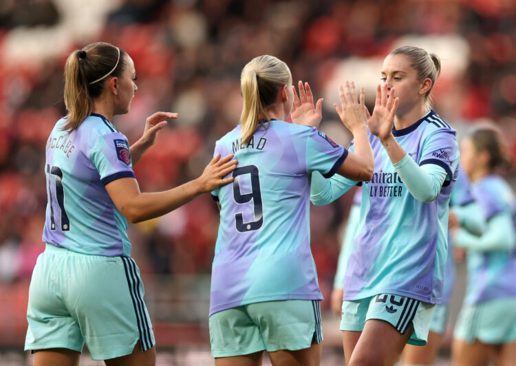 ST HELENS, ENGLAND - DECEMBER 15: Alessia Russo of Arsenal celebrates scoring her team's first goal with teammates Katie McCabe and Beth Mead durin...