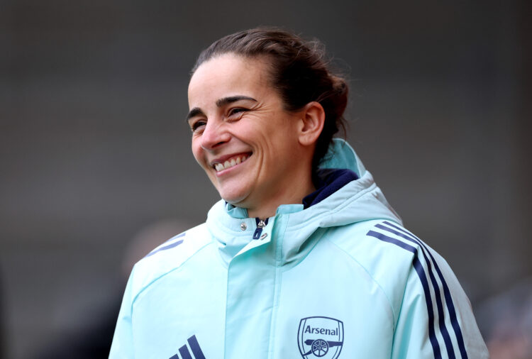 ST HELENS, ENGLAND - DECEMBER 15: Renee Slegers, Interim Manager of Arsenal, smiles as she looks on prior to the Barclays Women's Super League matc...