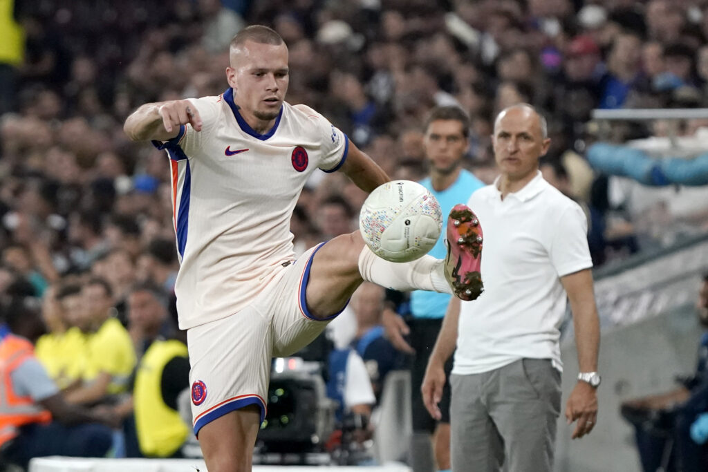 GENEVA, SWITZERLAND - AUGUST 29: (R) Mychajlo Mudryk of Chelsea in action during the UEFA Europa Conference League Play-Offs Second Leg match between Servette FC and Chelsea FC at Stade de Geneve on August 29, 2024 in Geneva, Switzerland. (Photo by Pier Marco Tacca/Getty Images)