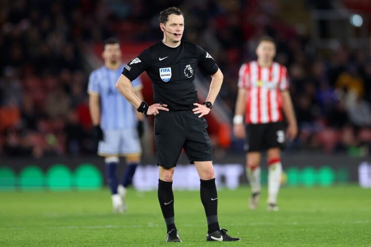 SOUTHAMPTON, ENGLAND: Referee Darren England looks on during the Premier League match between Southampton FC and Tottenham Hotspur FC at St Mary's ...