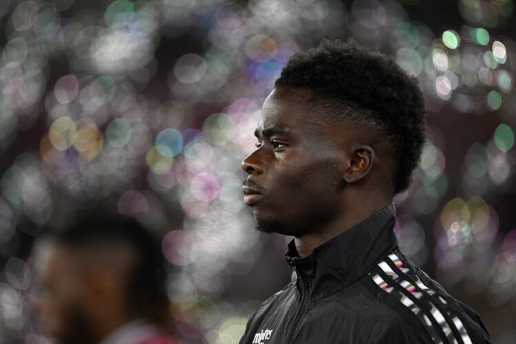 LONDON, ENGLAND: Bukayo Saka of Arsenal walks out for the Premier League match between West Ham United FC and Arsenal FC at London Stadium on Novem...