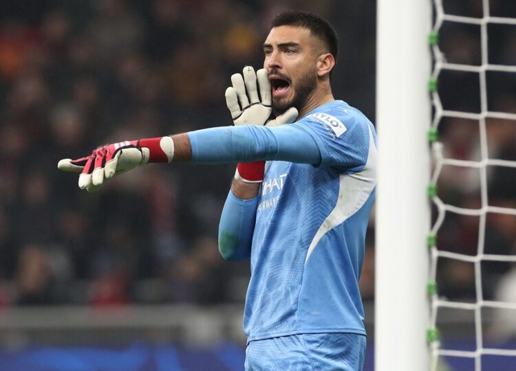 MILAN, ITALY: Paulo Gazzaniga of Girona FC shouts to his team-mates during the UEFA Champions League 2024/25 League Phase MD7 match between AC Mila...