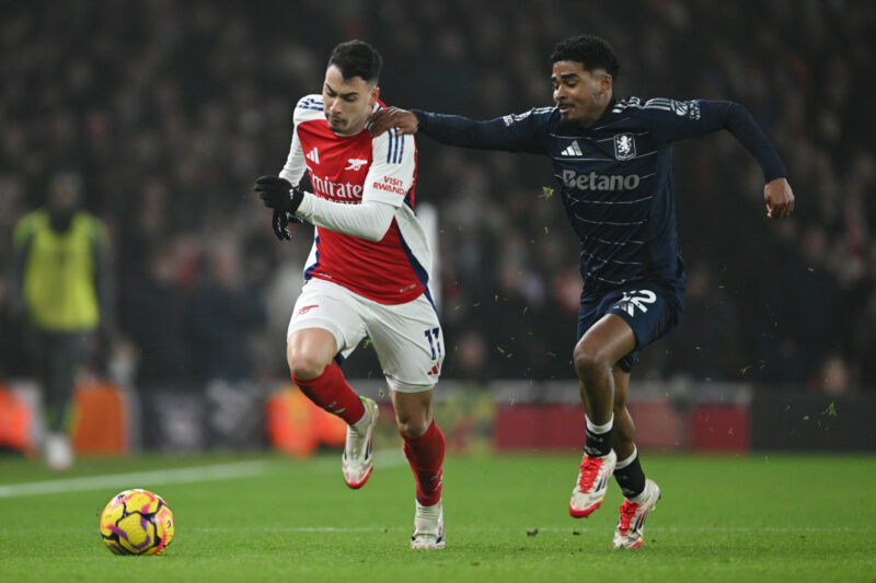 LONDON, ENGLAND - JANUARY 18: Gabriel Martinelli of Arsenal is challenged by Ian Maatsen of Aston Villa during the Premier League match between Ars...