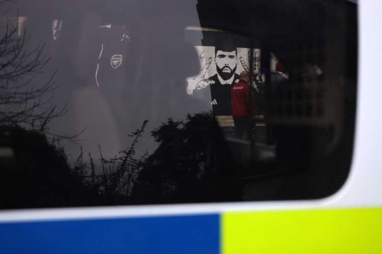 LONDON, ENGLAND - JANUARY 12: A general view of a mural of David Raya of Arsenal (not pictured) as a police vehicle passes by prior to the Emirates...